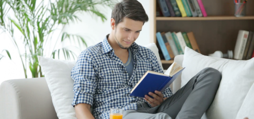 Shows an image of a person intrigued by his read